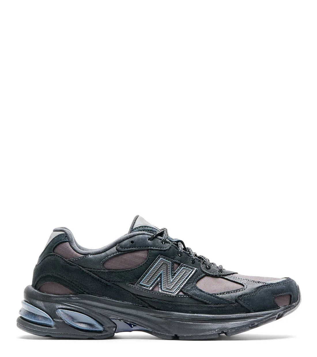 02.11.26 New Balance 2010 Black - SOMEWHERE